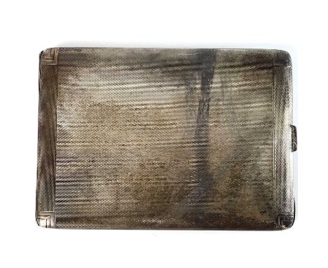 A George VI silver cigarette case. with engine turned decoration, interior engraved dedication, 8.5 x 11.5cm, 4.76 toz.