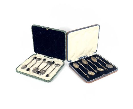 Two silver demi-tasse spoon sets,  both cased, including a coffee bean set for six, Sheffield 1936, the other with Art Deco h