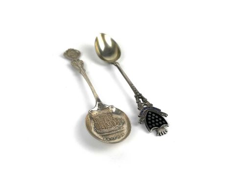 A George V silver and enamel Cornwall souvenir teaspoon, with Cornwall shield and inscribed 'ONE AND ALL' Birmingham 1913; to