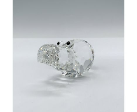 Adorable hippo figurine made from clear faceted crystal with black eyes and a frosted crystal tail. Swarovski backstamp 01518