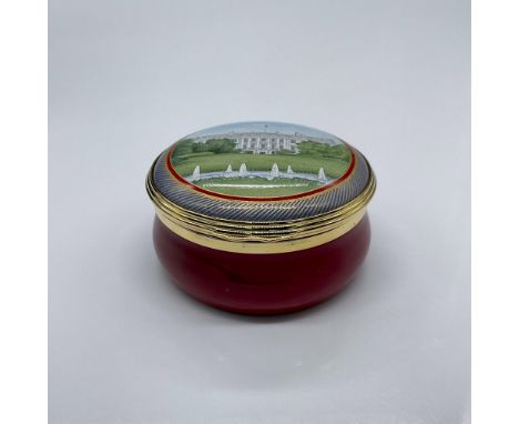 This limited edition enamel box was created in celebration of George W Bush's inauguration. It features a red box with an ima