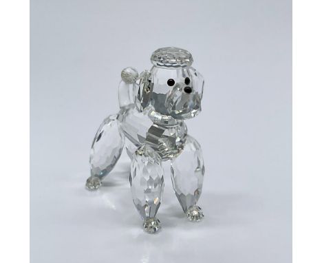 Made from clear crystal with black eyes and a black nose. This is variation 2 of the standing poodles, featuring a clear tail