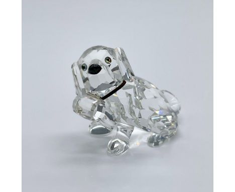 Features a cute clear crystal puppy with an elastic band around its neck, holding a clear crystal keg. This item has its orig