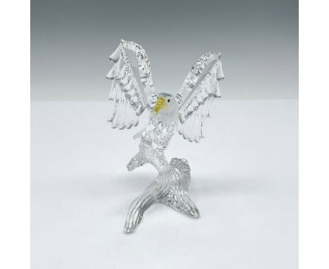 Part of the Feathered Beauties collection, figure is clear faceted crystal with wings spread, jet crystal eyes and yellow cry
