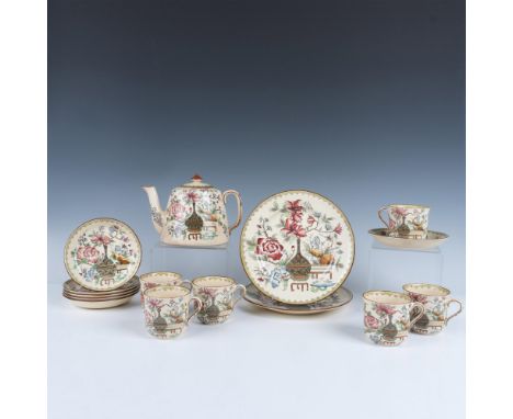 Amazing tea set in the Bottle Japan design. Each item is ivory with pink and blue flowers surrounding a green bottle. Include