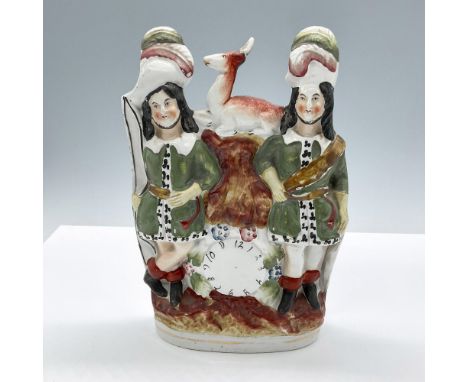 Handcrafted and hand-painted ceramic piece. Features two Victorian man standing with a deer in the center. Issued: c. 19th ce