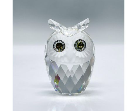 Features a faceted clear body with a frosted face and large citron eyes. This item has its original box measuring 5"H x 3.25"