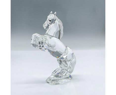 This charming horse stands on his two hind legs, with a faceted clear crystal body, a frosted tail and mane. This item has it