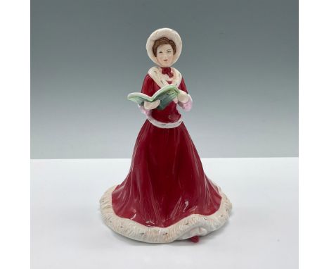 A brunette woman sings carols from a songbook, wearing a long red gown with white trim and a matching bonnet. Royal Doulton b