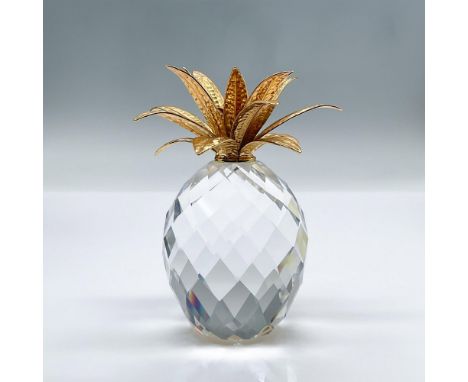 Features a faceted crystal body and large hammered golden leaves. This item has its original box measuring 5.5"H x 6.25" dia.