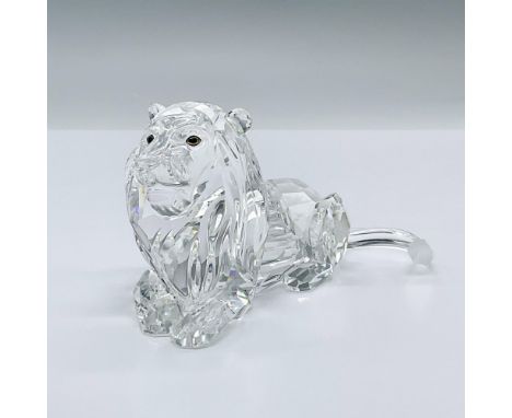 This fierce clear crystal lion has a frosted tail and black and yellow eyes. This item has its original box measuring 8"L x 6