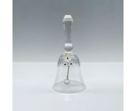 Clear crystal depiction of a bell with frosted flowers and a faceted handle. This figure was part of the Exquisite Accents co