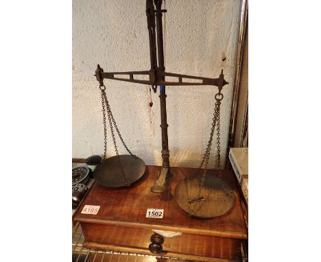 Set of steel scales on mahogany base with drawer and weights