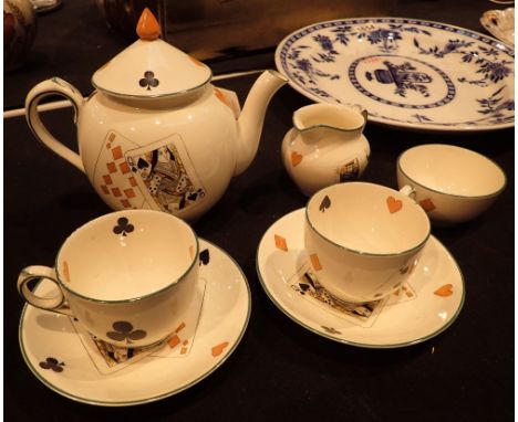 Booths Ceylon ivory playing card pattern teapot milk jug sugar bowl and two cups and saucers CONDITION REPORT: No cracks chip