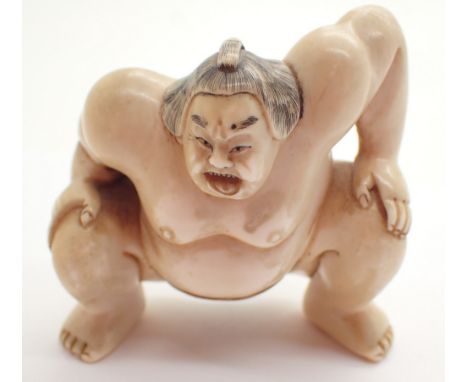 Antique ivory Netsuke of a Sumo wrestler signed to base H: 5 cm 