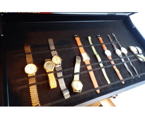Watch display box and a selection of wristwatches including Rotary and Sekonda examples
