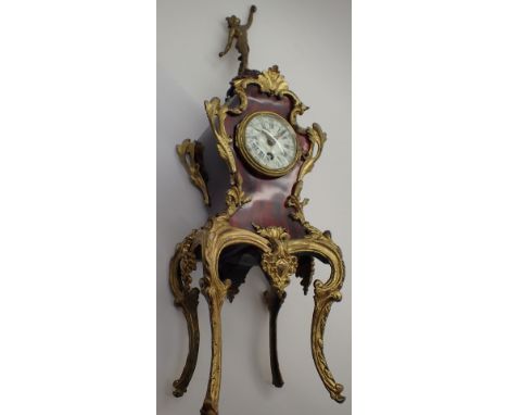 Antique style ormolu and faux tortoiseshell mantel clock with mechanical movement ( lacking key )