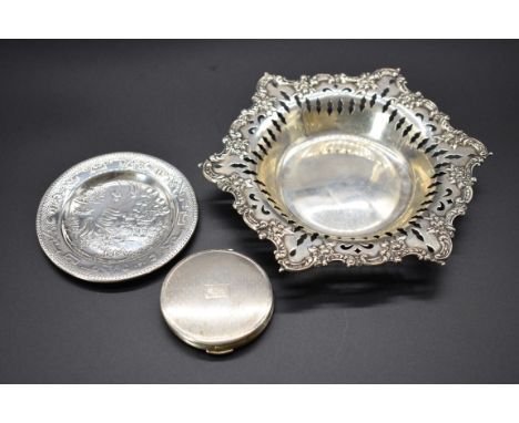 An American pierced white metal dish, stamped 'Sterling', 18cm, 116g; together with a chinoiserie silver pin dish, by William