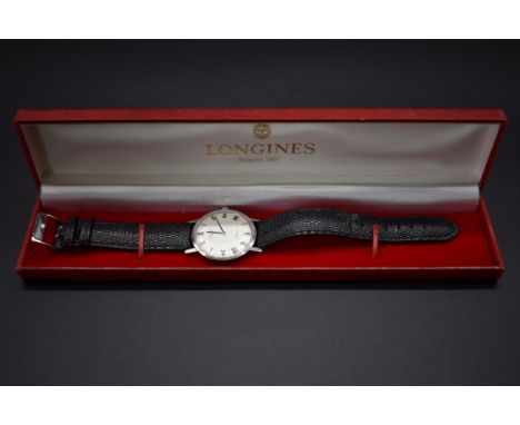A Longines Record stainless steel manual wind wristwatch,&nbsp;35mm, on replacement leather strap, with box. 