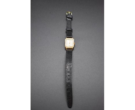 A vintage Ancre yellow metal manual wind ladies wristwatch,&nbsp;stamped '18k .750', 15mm, on replacement leather strap. 