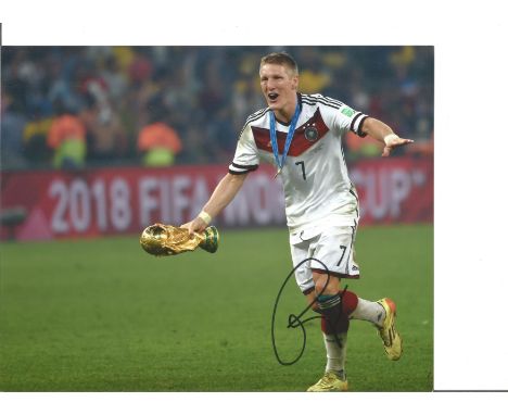 Football Bastian Schweinsteiger 10x8 signed colour photo pictured with World Cup while playing for Germany. Bastian Schweinst