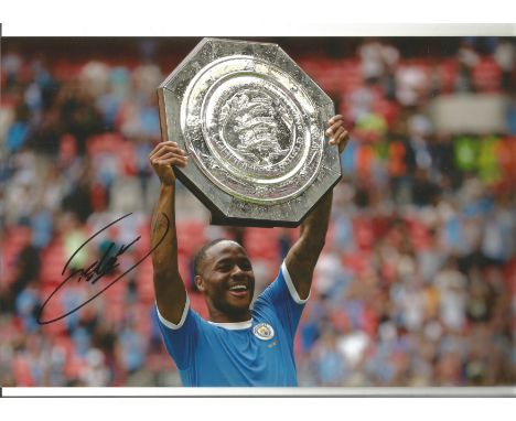 Football Raheem Sterling signed 12x8 colour photo pictured holding The Community Shield. Raheem Shaquille Sterling is a profe