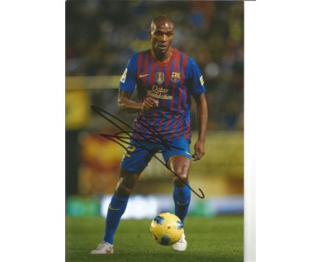 Football Eric Abidal signed 12x8 colour photo pictured in action for Barcelona. Eric Sylvain Abidal is a French former profes