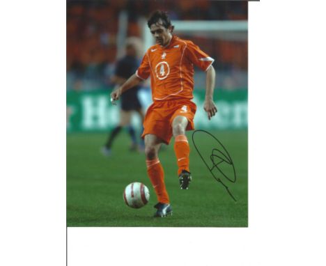 Football Philip Cocu signed 10x8 colour photo pictured playing for Holland. Good Condition. All signed pieces come with a Cer