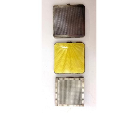 Three Silver and Enamel Mounted Hinged Compacts, including an engine turned compact by Crisford &amp; Norris Ltd, Birmingham 