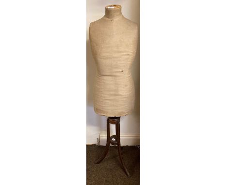 Edwardian Mannequin, a fabric mounted torso, stamped 'WS' to the underside and size 42, on an oak tripod base