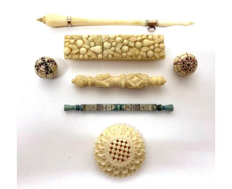 19th Century Ivory Sewing Accessories, including a Dieppe ivory needle case carved with fruit, pears and leaves; tambour hook