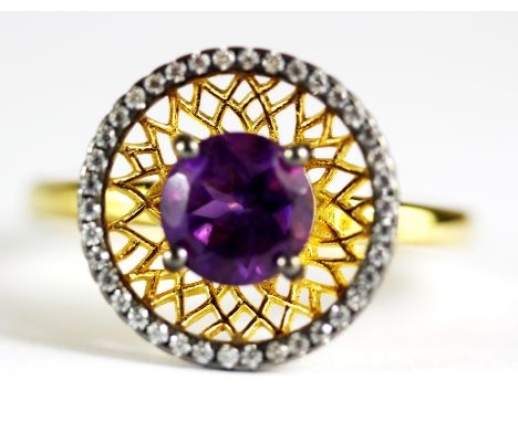 A 925 silver gilt amethyst and cubic zirconia set ring, Dia. 1cm, (R). Condition : excellent condition. Estimated insurance r