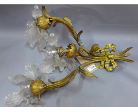 An Art Nouveau style ormulu three branch wall light with leaf decoration
