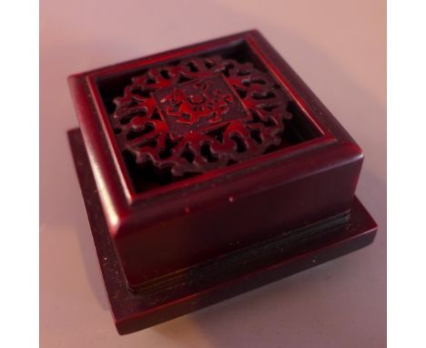 A Chinese carved soapstone seal contained in a carved stone box H 4 x W 6 x D 6cm 