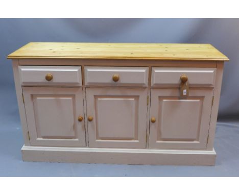 A contemporary light grey painted pine sideboard having three short drawers over three cupboard doors raised on a plinth base