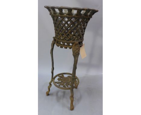 A cast iron planter raised on three supports joined by an undertier H 80 x W 33 x D 33cm 