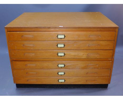 A light oak plan chest of six drawers H 87 x W 128 x D 96cm 