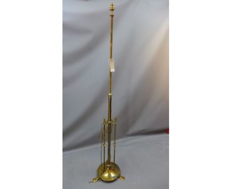 An Arts and Crafts extending brass standard lamp 190cm highly fully extended 
