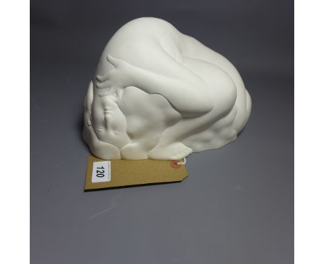 A Japanese white ceramic sculpture of a curled up woman, signed in Japanese 'Konno' dated 1980, H 14 x W 26 x D 22cm 