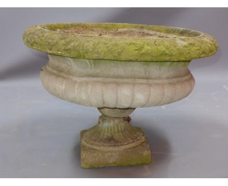 A large reconstituted stone garden planter of urn form H 43 x Diameter 63cm 