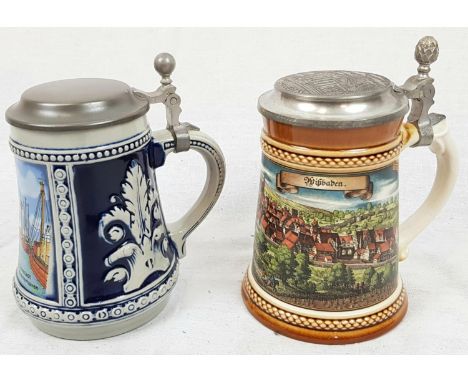 A Pair of Decorated German Ceramic Beer Steins. 15cm tall. 