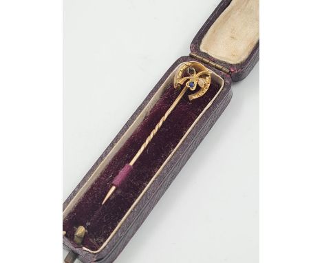 A Vintage 9ct Gold Stickpin with Horseshoe Charm. 5cm 1.3g. Original box.
