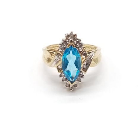 10K Topaz and diamond ring. 4.15g and Size O 