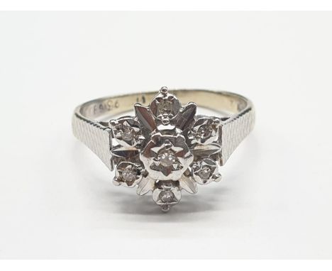 9ct Gold and Diamond RING in flower design.  2.9g  Size: O 