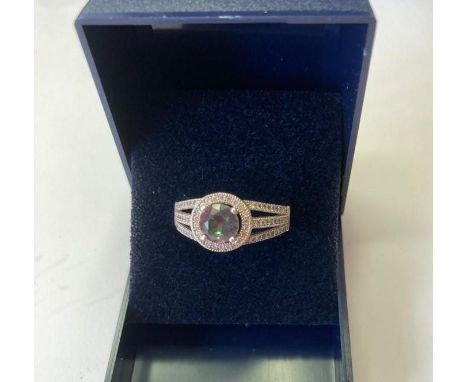 Silver ring with circular Mystic Topaz to top. Marcasite surround with pierced marcasite shoulders. Size P. 