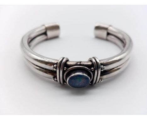 Opal silver bangle, weight 28g and 6.5cm width 