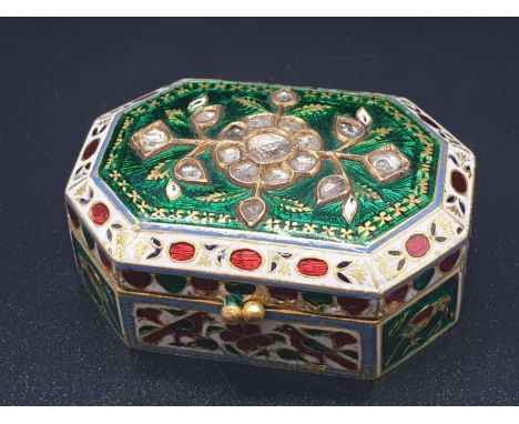 an exquisitely decorated 22ct gold and enamel pill box adorned with diamonds, 4 x 2.8cms and weighing 32.5gms 