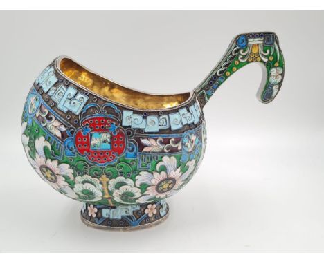 An Antique Russian Silver-Gilt Enamel Kovsh. Polychrome Cloisonne enamel on a multi-coloured background. Floral designs and g