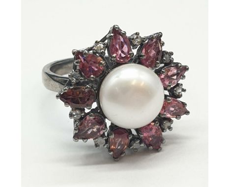 4.40 Cts Pearl &amp; 2.35 Cts Pink Tourmalines set inside a 925 Blackened silver ring. With 0.20 Cts rose cut diamonds 