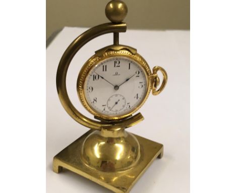 Vintage gold plate omega pocket watch &amp; stand working but sold with no guarantees